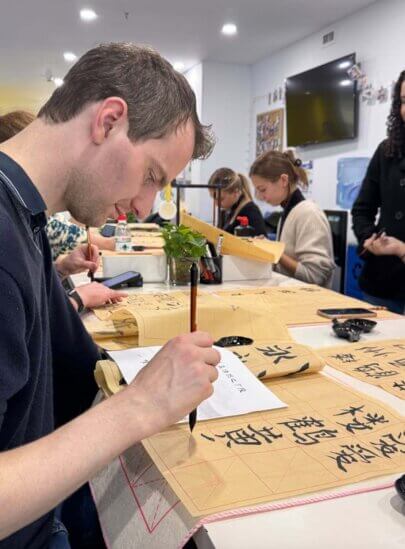 David from Germany doing calligraphy